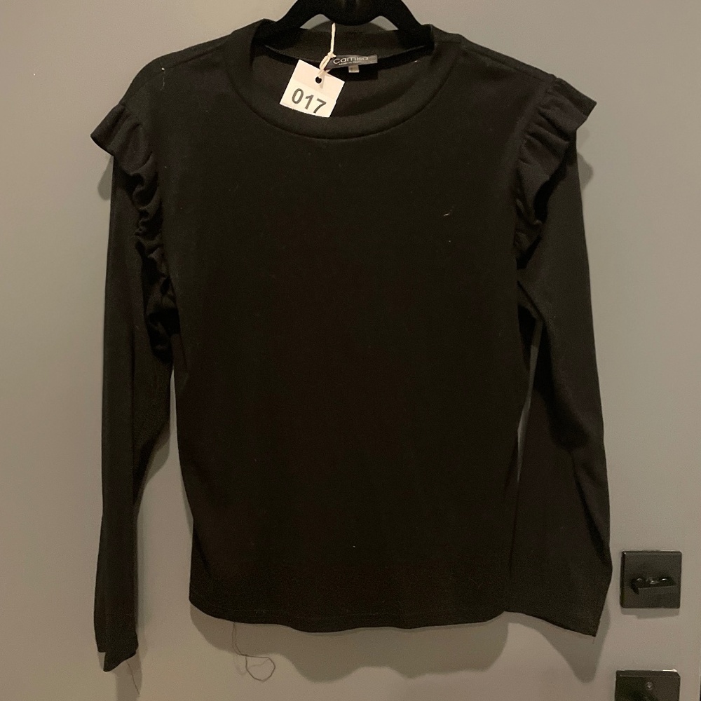 Black long sleeve top with ruffles on shoulders